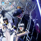 El jugador multijugador VR del zombi 4-5 del equipo del parque de atracciones de VR que tiraba fijó la máquina de la realidad virtual 9D